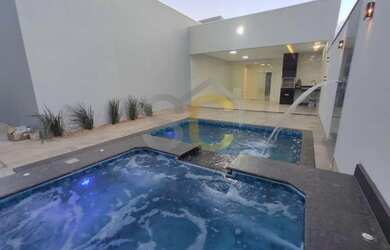 Imagem: A casa possui 3 Dormitórios, 3 Banheiros, 3 Vagas na garagem