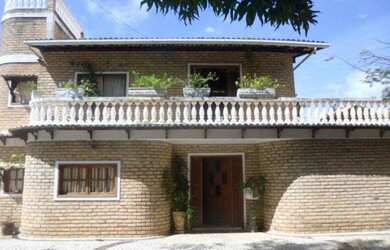 Imagem: A casa para alugar possui 4 Dormitórios, 5 Banheiros, 1 Vaga