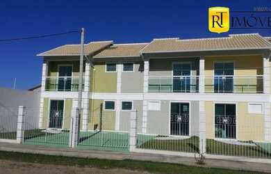 Imagem: A casa possui 2 Dormitórios, 2 Banheiros, 1 Vaga na garagem