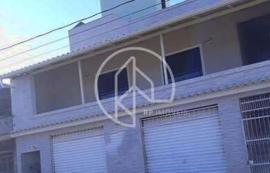 Imagem: A casa possui 3 Dormitórios, 3 Banheiros, 2 Vagas na garagem