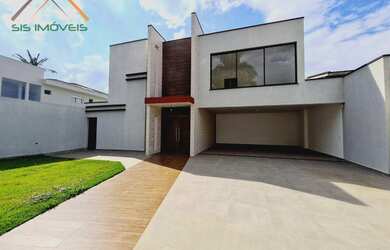 Imagem: A casa possui 3 Dormitórios, 3 Banheiros, 5 Vagas na garagem