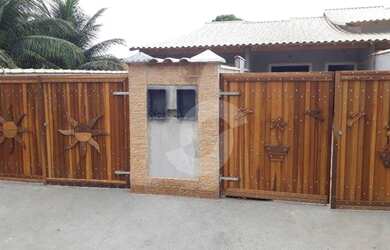 Imagem: A casa possui 2 Dormitórios, 1 Banheiro, 1 Vaga na garagem