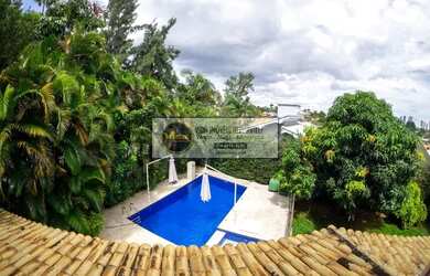 Imagem: A casa em condomínio possui 4 Dormitórios, 5 Banheiros, 5