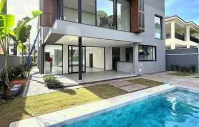 Imagem: A casa em condomínio possui 4 Dormitórios, 5 Banheiros, 5