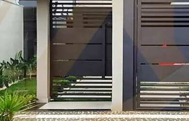 Imagem: A casa possui 2 Dormitórios, 1 Banheiro, 2 Vagas na garagem