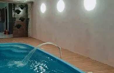 Imagem 2: Casa na praia com piscina