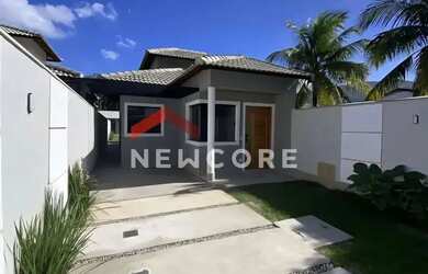 Imagem: A casa possui 2 Dormitórios, 3 Banheiros, 2 Vagas na garagem