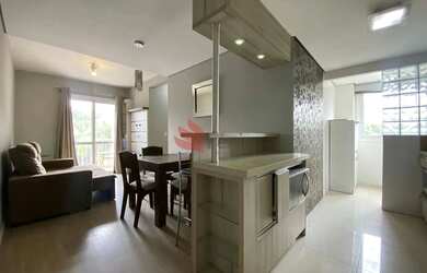 Imagem: O apartamento possui 2 Dormitórios, 1 Banheiro, 1 Vaga na garagem