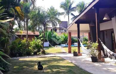 Imagem: A casa possui 5 Dormitórios, 4 Banheiros, 4 Vagas na garagem