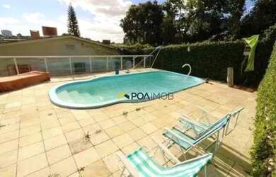 Imagem: A casa possui 4 Dormitórios, 4 Banheiros, 5 Vagas na garagem