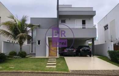 Imagem: A casa possui 3 Dormitórios, 5 Banheiros, 4 Vagas na garagem