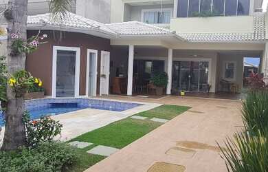 Imagem: A casa em condomínio possui 4 Dormitórios, 5 Banheiros, 5