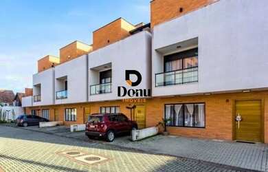 Imagem: A casa em condomínio possui 3 Dormitórios, 4 Banheiros, 2