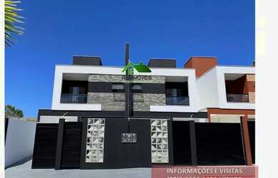 Imagem: A casa possui 3 Dormitórios, 3 Banheiros, 2 Vagas na garagem