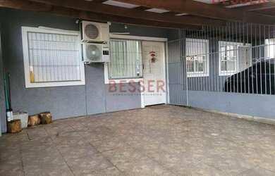 Imagem: A casa possui 2 Dormitórios, 1 Banheiro, 2 Vagas na garagem