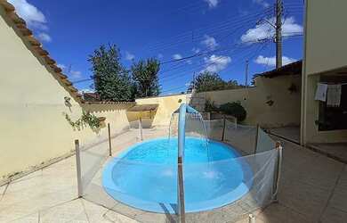 Imagem: A casa em condomínio possui 4 Dormitórios, 3 Banheiros, 2