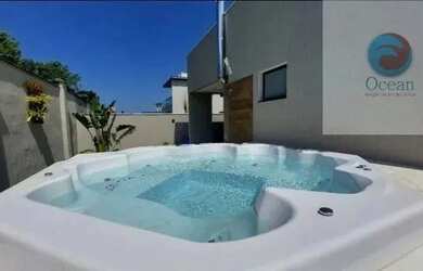 Imagem: A casa possui 4 Dormitórios, 4 Banheiros, 5 Vagas na garagem