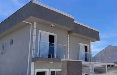 Imagem: A casa possui 2 Dormitórios, 3 Banheiros, 2 Vagas na garagem