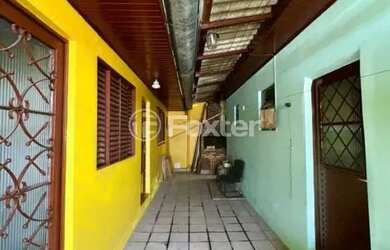 Imagem: A casa possui 3 Dormitórios, 3 Banheiros, 3 Vagas na garagem