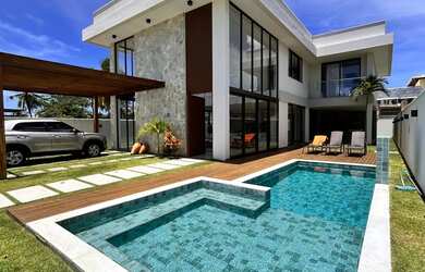 Imagem: A casa em condomínio possui 5 Dormitórios, 5 Banheiros, 5