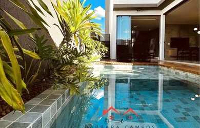 Imagem: A casa em condomínio possui 4 Dormitórios, 4 Banheiros, 3