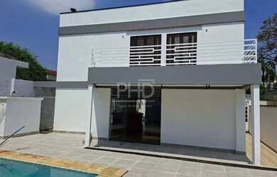 Imagem: A casa possui 3 Dormitórios, 3 Banheiros, 5 Vagas na garagem