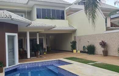 Imagem 3: Casa de condomínio para venda tem 440 metros quadrados com 4 quartos