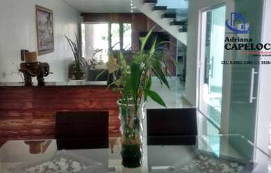 Imagem: A casa possui 3 Dormitórios, 3 Banheiros, 2 Vagas na garagem