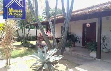 Imagem: A casa possui 3 Dormitórios, 3 Banheiros, 4 Vagas na garagem