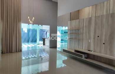 Imagem: A casa possui 3 Dormitórios, 4 Banheiros, 4 Vagas na garagem