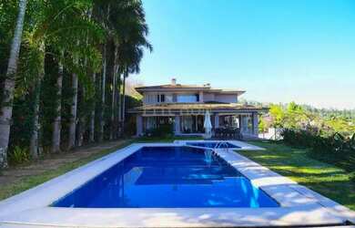 Imagem: A casa em condomínio possui 4 Dormitórios, 5 Banheiros, 4