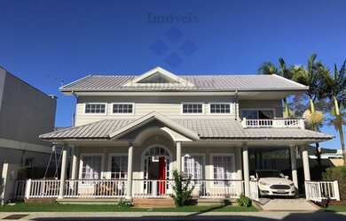 Imagem: A casa em condomínio possui 3 Dormitórios, 4 Banheiros, 2