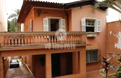 Imagem: A casa possui 4 Dormitórios, 5 Banheiros, 5 Vagas na garagem