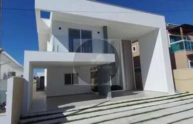 Imagem: A casa possui 3 Dormitórios, 2 Banheiros, 4 Vagas na garagem