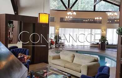 Imagem: A casa em condomínio possui 5 Dormitórios, 5 Banheiros, 5