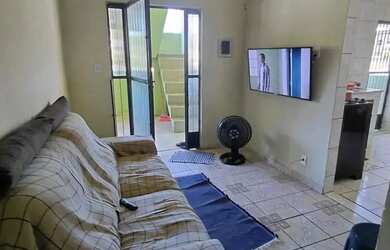 Imagem: A casa possui 2 Dormitórios, 1 Banheiro, 1 Vaga na garagem