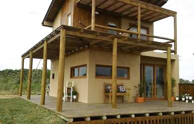 Imagem: A casa possui 5 Dormitórios, 4 Banheiros, 180m² de Área