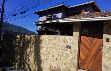 Imagem: A casa possui 3 Dormitórios, 1 Banheiro, 3 Vagas na garagem