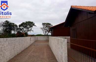 Imagem 6: Duas casas recém construídas localizada em Imbituba, situada no bairro...