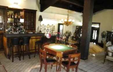 Imagem: A casa em condomínio possui 4 Dormitórios, 5 Banheiros, 5