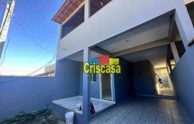 Imagem: A casa possui 3 Dormitórios, 2 Banheiros, 2 Vagas na garagem