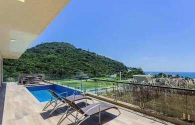 Imagem: A casa em condomínio possui 5 Dormitórios, 5 Banheiros, 5