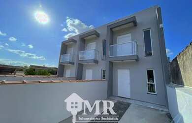 Imagem: A casa possui 2 Dormitórios, 1 Banheiro, 2 Vagas na garagem