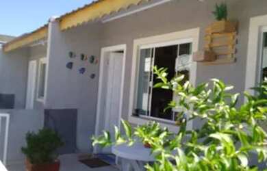 Imagem: A casa possui 2 Dormitórios, 1 Banheiro, 1 Vaga na garagem