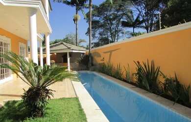 Imagem: A casa em condomínio à venda possui 4 Dormitórios, 5 Banheiros