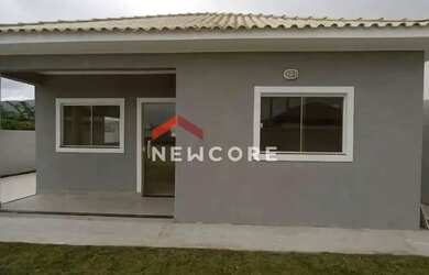 Imagem: A casa possui 3 Dormitórios, 3 Banheiros, 4 Vagas na garagem