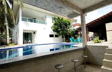 Imagem: A casa em condomínio possui 5 Dormitórios, 5 Banheiros, 5