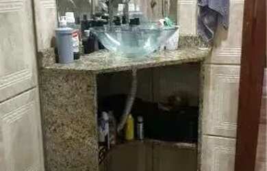 Imagem: A casa possui 3 Dormitórios, 4 Banheiros, 3 Vagas na garagem