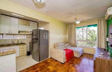 Imagem: O apartamento possui 2 Dormitórios, 1 Banheiro, 2 Vagas na