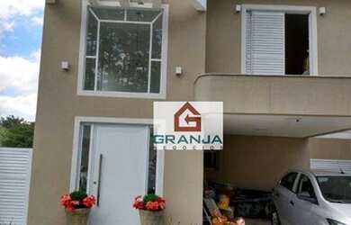 Imagem: A casa possui 3 Dormitórios, 3 Banheiros, 2 Vagas na garagem